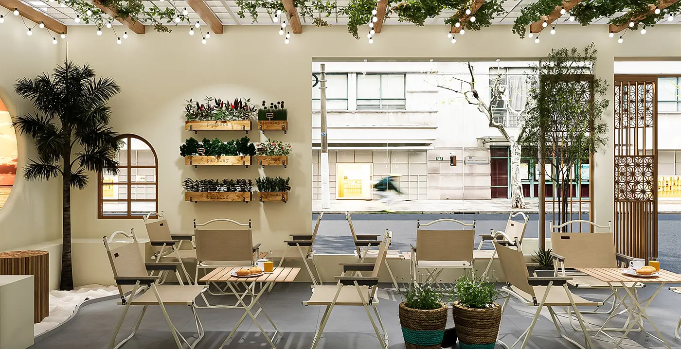 Một góc tiểu cảnh nước và cây xanh trong thiết kế quán cafe sân vườn do Nắng Decor thực hiện.